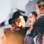 People laughing and connecting in warm golden light